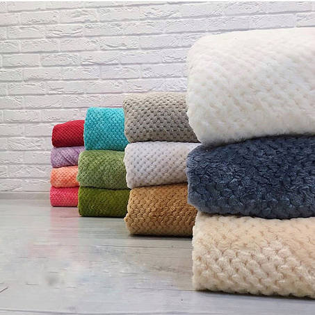 Пледи і покривала