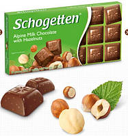 Шоколад Schogetten Milk chocolate with hazelnuts Молочный с лесными орехами 100г