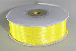 Стрічка атласна. Колір жовтий. Ширина — 0,3 см, довжина — 123 м