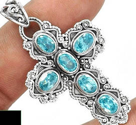 Срібний хрестик із топазами