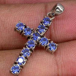 Срібний хрестик із сапфірами