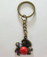 Брелок Лев бронзу покриття Корал / Брелок Лев бронзу покриття Корал 2x2 см