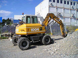 Колісний екскаватор ATLAS 1004