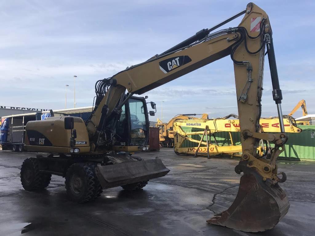 Колісний екскаватор CATERPILLAR M315, фото 1