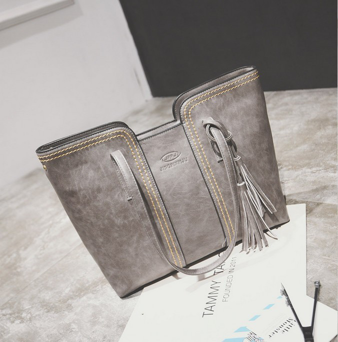 Жіноча сумка велика сіра з пензликом із якісної екошкіри, фото 1