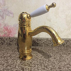 Золотий змішувач для умивальника з білою ручкою Bugnatese Oxford 6319