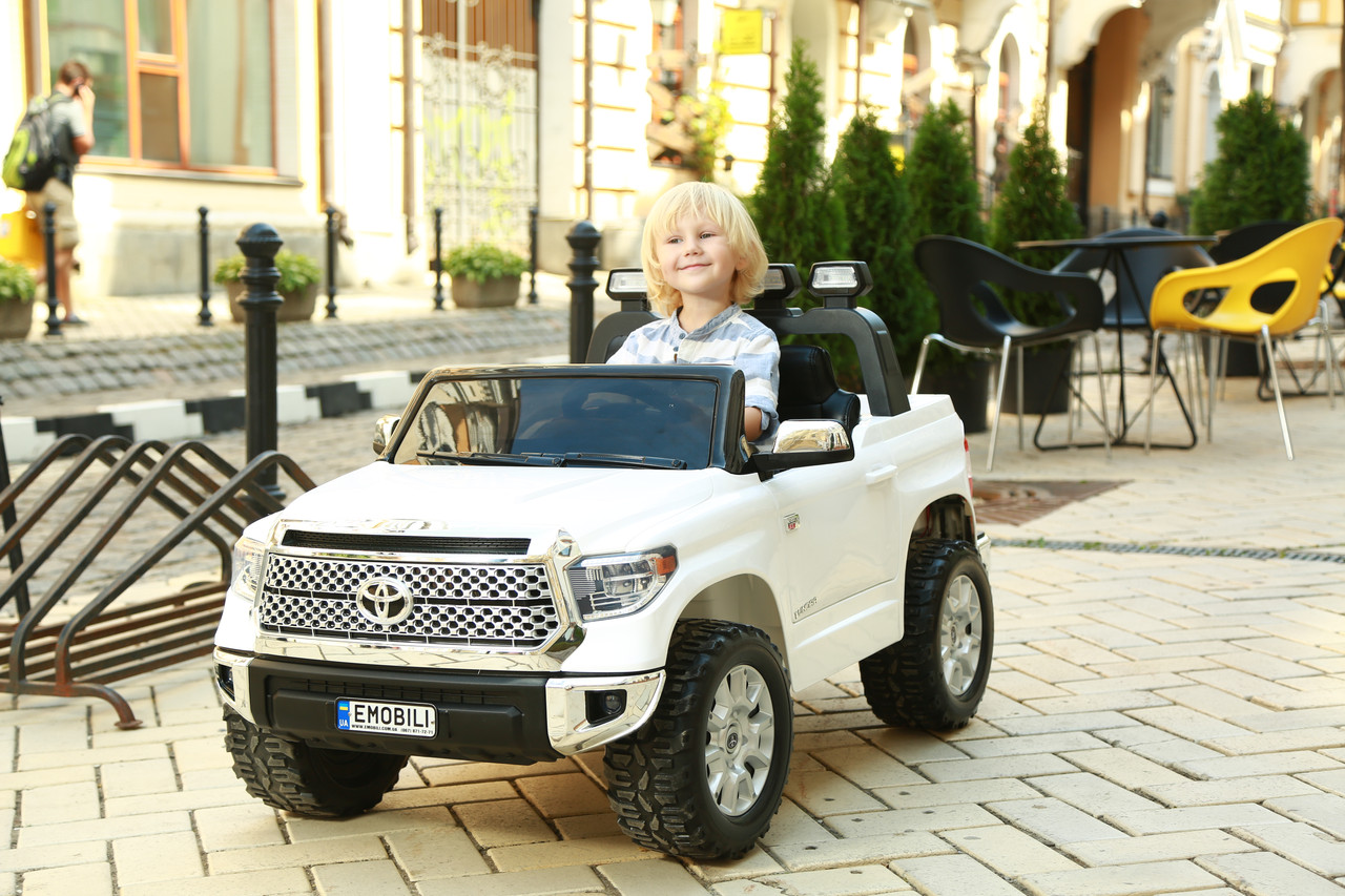 Дитячий електромобіль джип Toyota Tundra 12V 14AH, багажник, ручка для транспортування, шкіряні сидіння