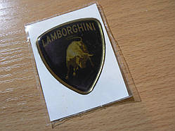 Наклейка s вставка в емблему Lamborghini 44х49х1мм силіконова емблема на дитячий автомобіль Ламборджині