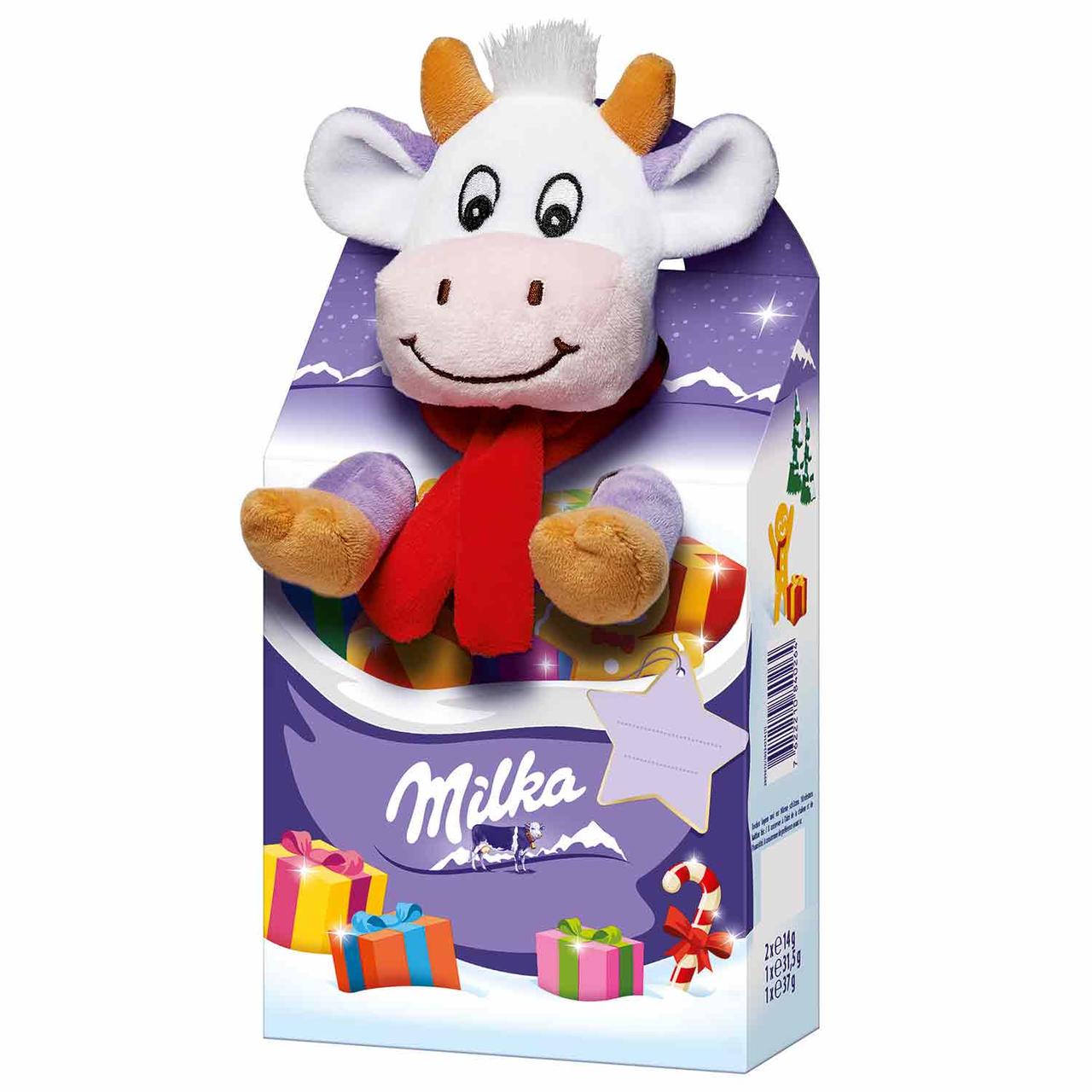 Новорічний подарунок дитині Milka Plüschtier Magic Mix Kuh (м'яка іграшка зі солодощами), 133 г.