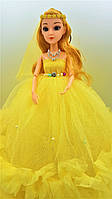 Лялька Барбі в жовтому платті