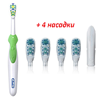 Зубна щітка Oral-B Cross Action Complete на батарейці, B1010F (5 насадок в комплекті)