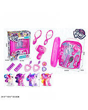 Поні у валізі з перукарським набором