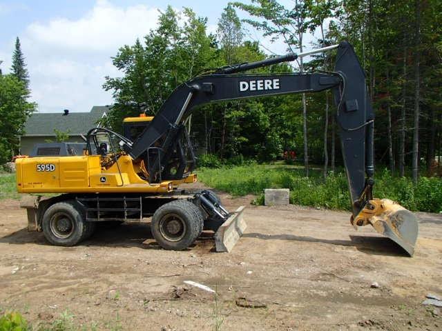 КОЛІСНИЙ ЕКСКАВАТОР JOHN DEERE 595D, фото 1