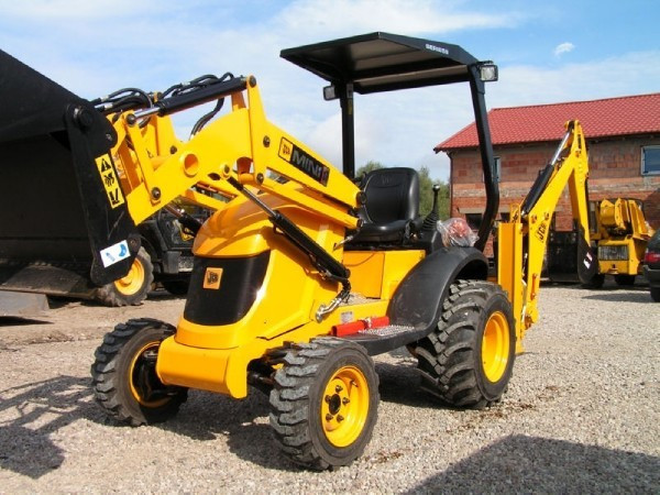 Екскаватор-навантажувач MINI CX JCB, фото 1