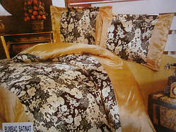 Атласна постільна білизна золотиста з квітковим принтом