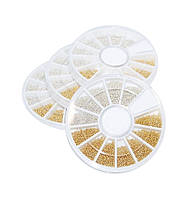 Бульйонки металеві в каруселі Золото — Срібло