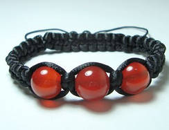 Плетені браслети на 3 каменю