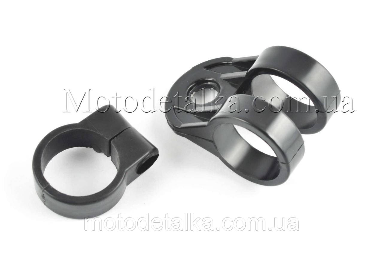 Тримачі троса та ременя мотокоси