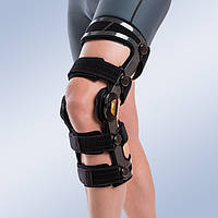 Армированный функциональный коленный ортез с ограничителем Orliman OCR200