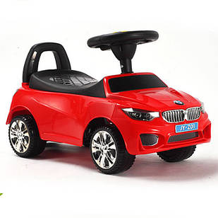 Машинка каталка-толокар BMW з музичною панеллю