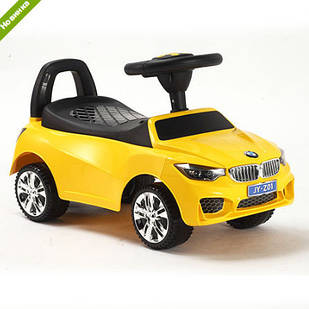 Машинка каталка-толокар BMW з музичною панеллю
