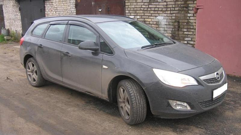 Дефлектори вікон (вітровики) OPEL Astra J Sports Tourer 2010 Cobra tuning O12410