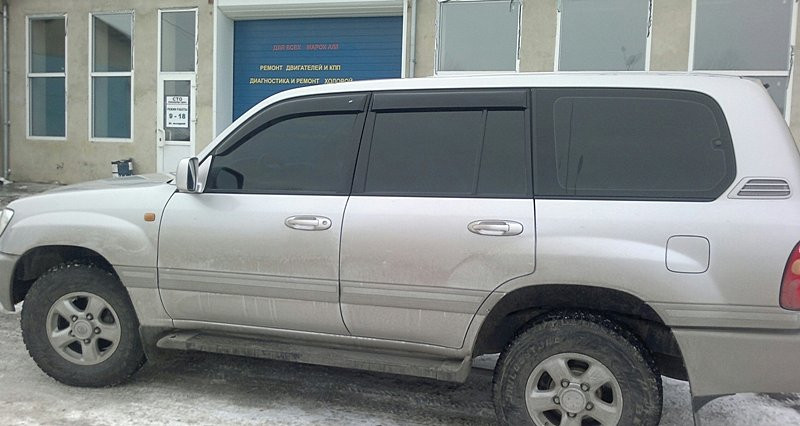 Дефлектори вікон (вітровики) Тойота Land Cruiser 100 1998/Лексус LX (UZJ100) 1998-2001 "EuroStandart" Cobra