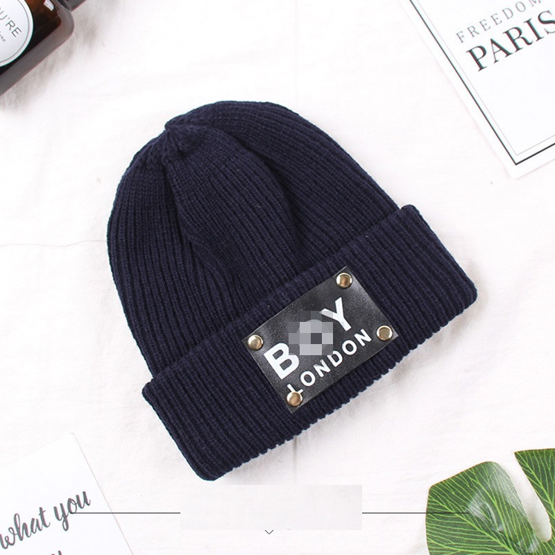 Тепла шапка для хлопчика синя з одворотом і лейбою, фото 1