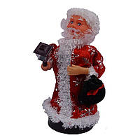 Дід Мороз, що співає, під ялинку