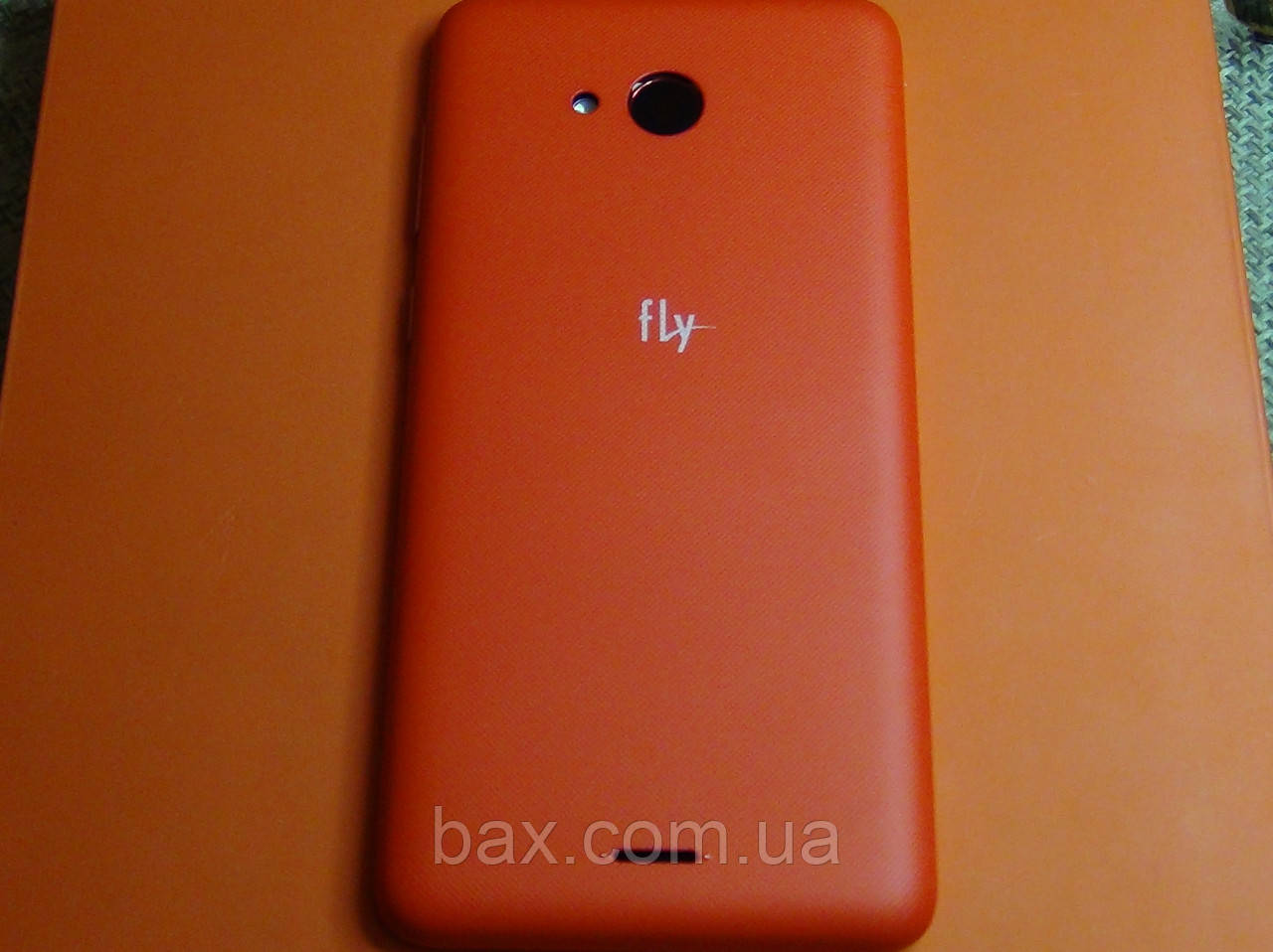 Fly FS458 кришка АКБ червоний + середня частина