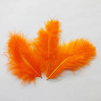 Пір'я натуральне жовтогаряче (10 штук)