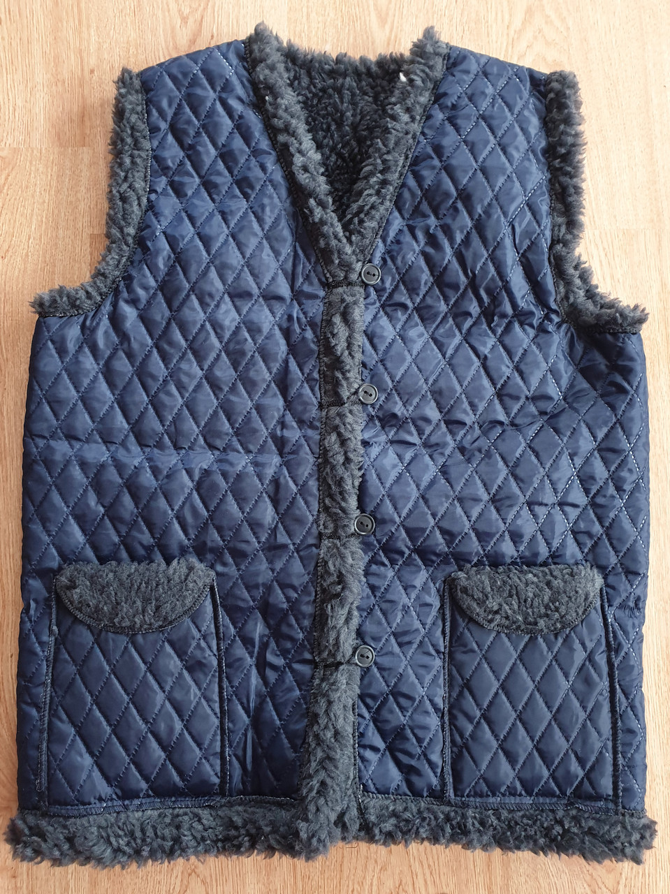 Жилетки на штучному хутрі