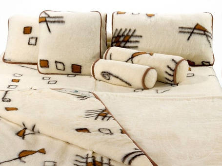 Ковдри та подушки з овечої вовни