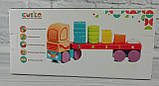 Дерев'яна іграшка Тягач з геометричними фігурами №13425 LM-13 Левеня Україна, фото 2