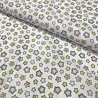 Ситець із дрібними різнобарвними зірочками на білому тлі ширина 97,5 см