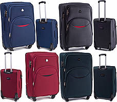 Чемодан дорожній на 4 колесах з цупкої тканини CODURA 1200D 360* Валіза 66х43х28см WINGS 1708 , середній
