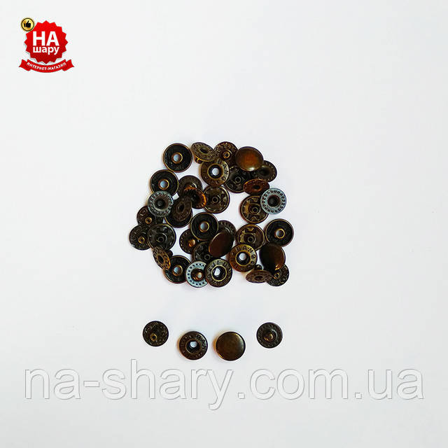 На фото Кнопки для одягу альфа 15, антик