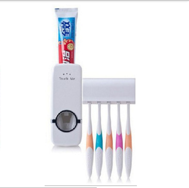 Дозатор для зубної пасти з тримачем зубних щіток