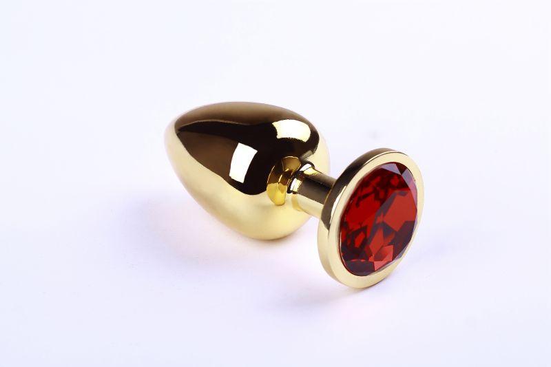Золотая пробка с красным камнем, размер L + Чехол