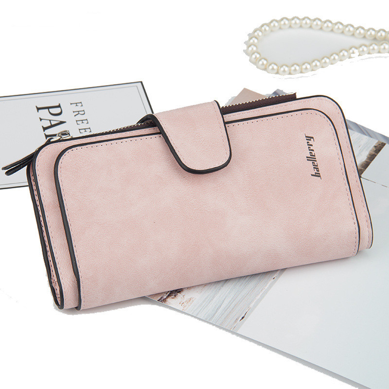 Жіночий рожевий гаманець на кнопці