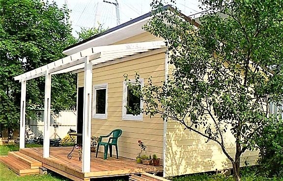 Недорогий каркасний будинок фото