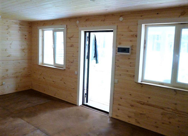 Недорогий каркасний будинок фото