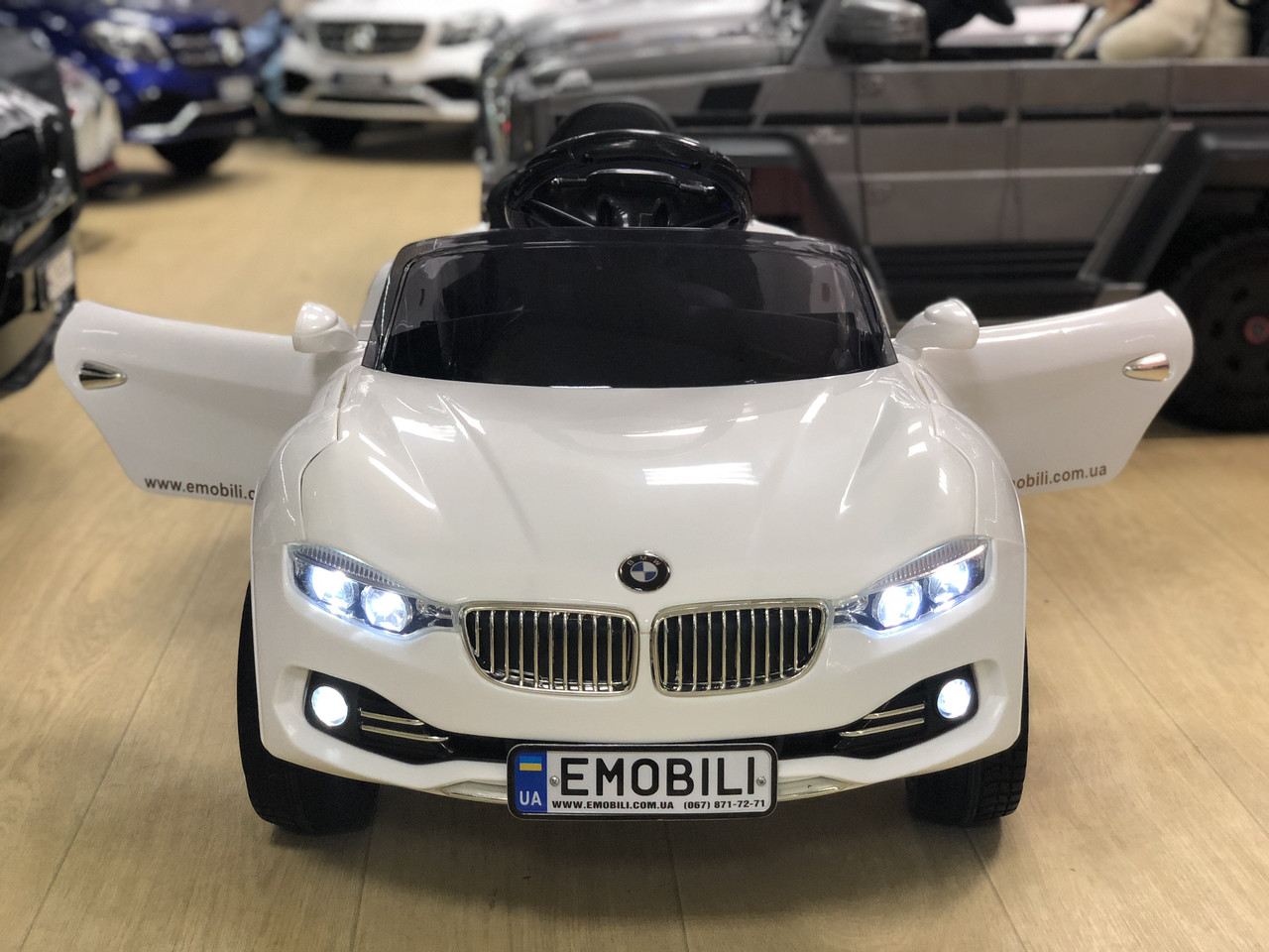 Дитячий електромобіль BMW Cabrio, одномісний, амортизатори 4 шт., мотори 2 шт., ручка, коліщатка, фото 1