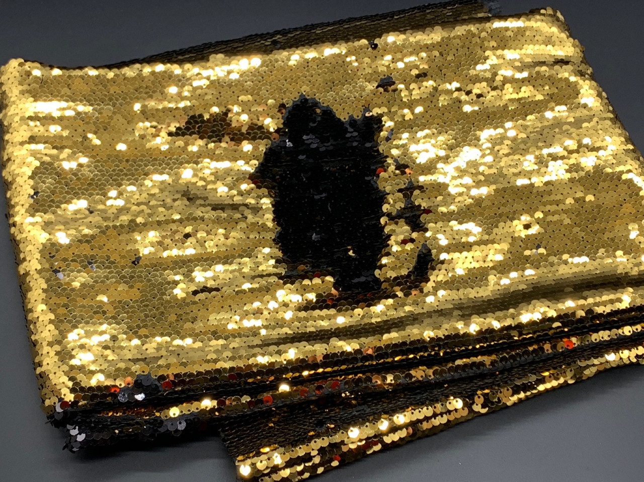 Тканина пайєтка двостороння. Колір золотисто-чорний., фото 1