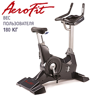 Профессиональный вертикальный велотренажер AeroFit PRO 9900B