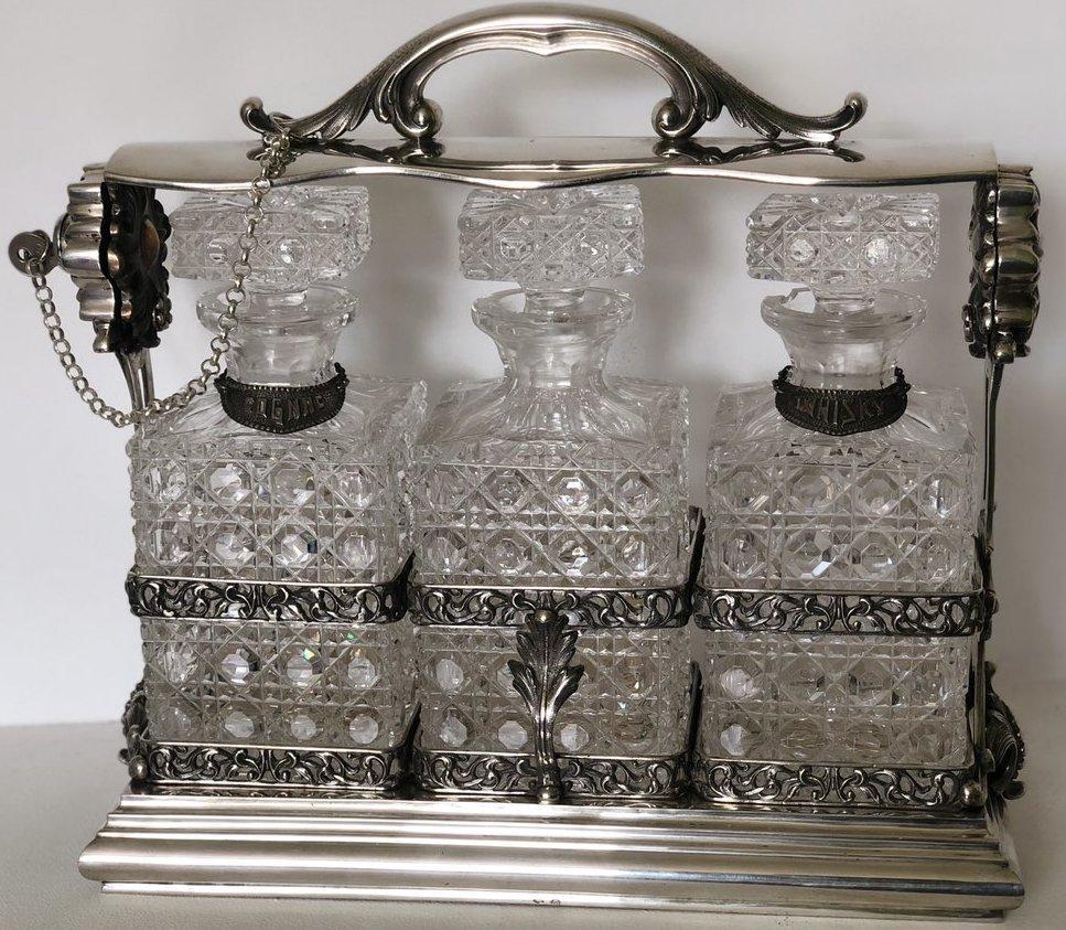 Срібна підставка з трьома кришталевими графинами під віскі, коньяк, горілку поч. ХХ століття