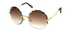 Круглі сонячні окуляри жіночі коричневі Chloe з хвилеподібними краями лінзи