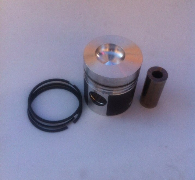 Поршень в зборі з кільцями і пальцем на Zetor 8401