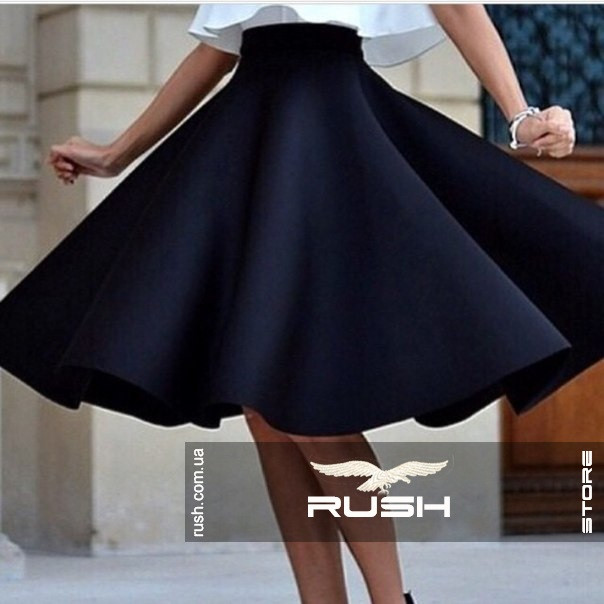 Розкльошена спідниця до коліна