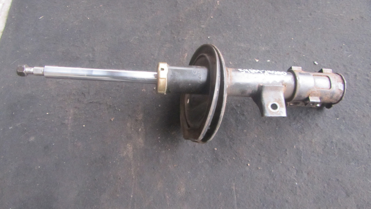 Амортизатор передній лівий Kia Magentis 546512G200, фото 1